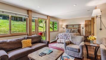 1 bedroom, desk, iron/ironing board, travel crib