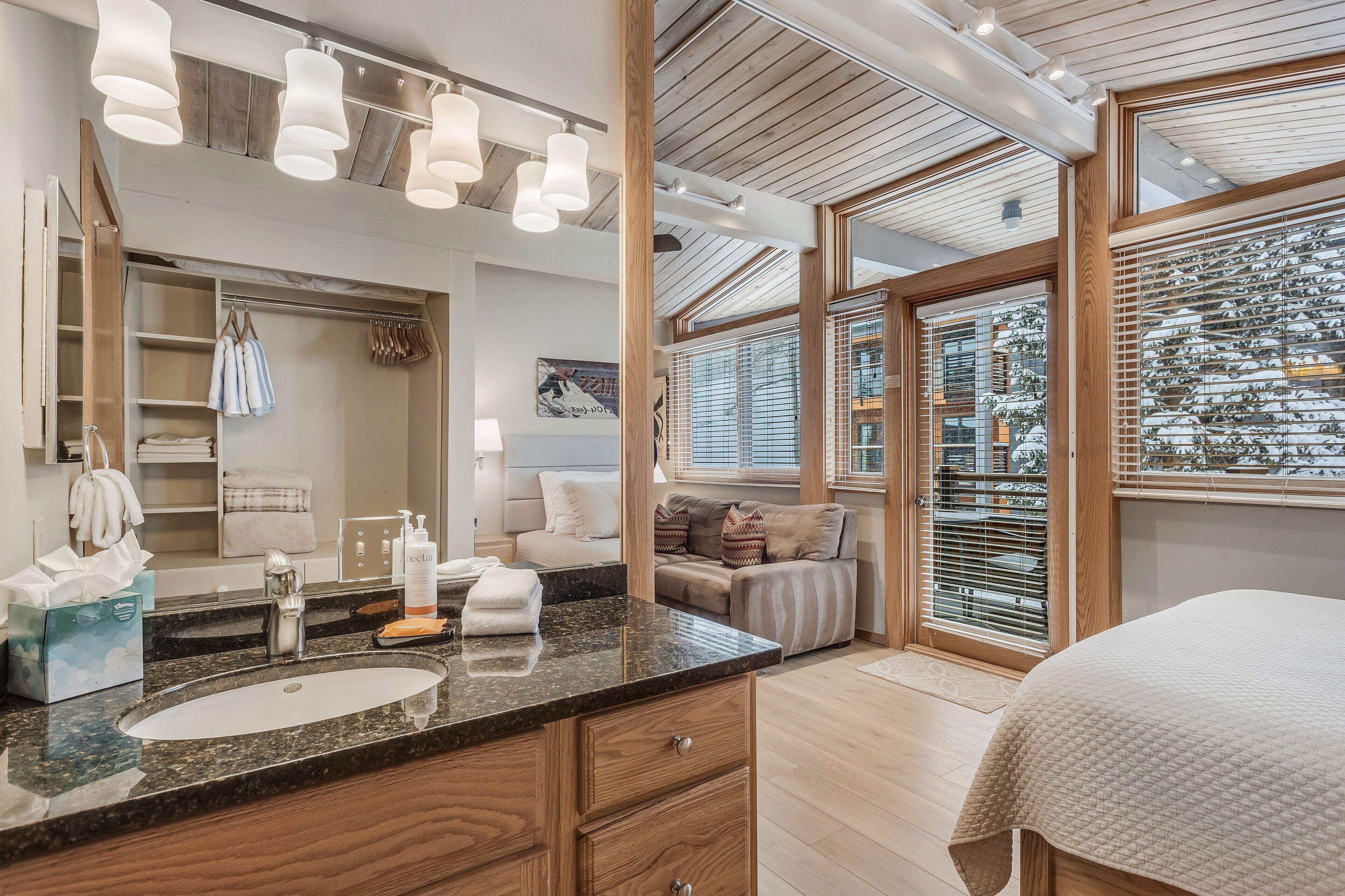 1 bedroom, desk, iron/ironing board, travel crib