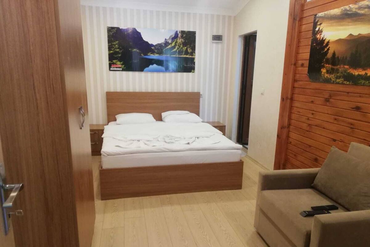 Deluxe-Villa | Badezimmer | Dusche, kostenlose Toilettenartikel, Haartrockner, Hausschuhe