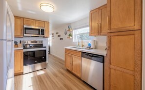 Fridge, microwave, oven, coffee/tea maker - Bleistein Cottage-  Comfortable, Pet Friendly Home (Cody)