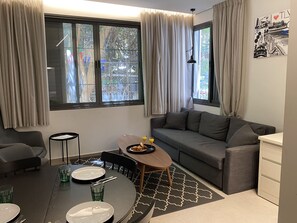 Appartement | Coin séjour | Télévision à écran plat