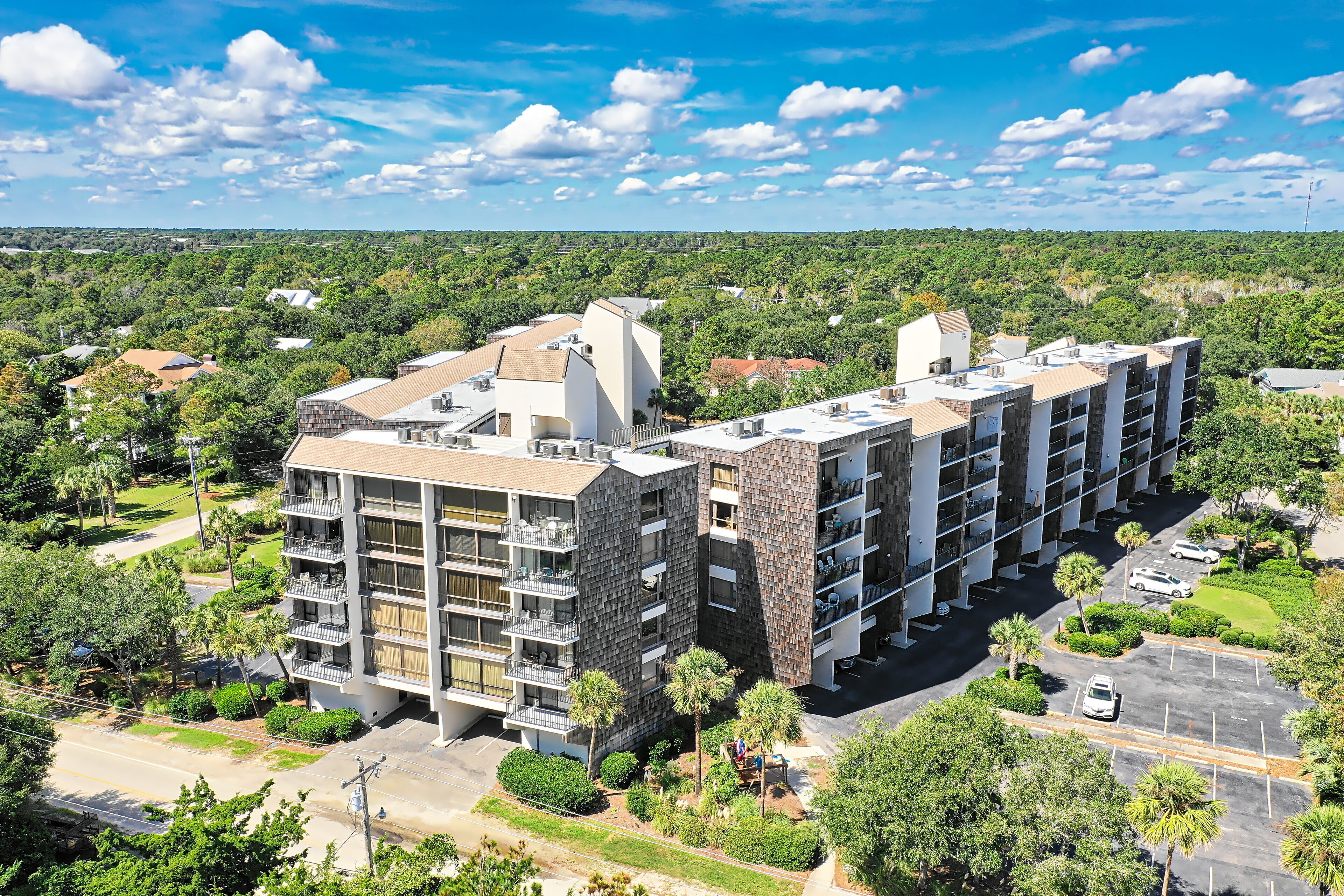 Second row condo, 4th floor, beach access across road, balcony, pool, grill area