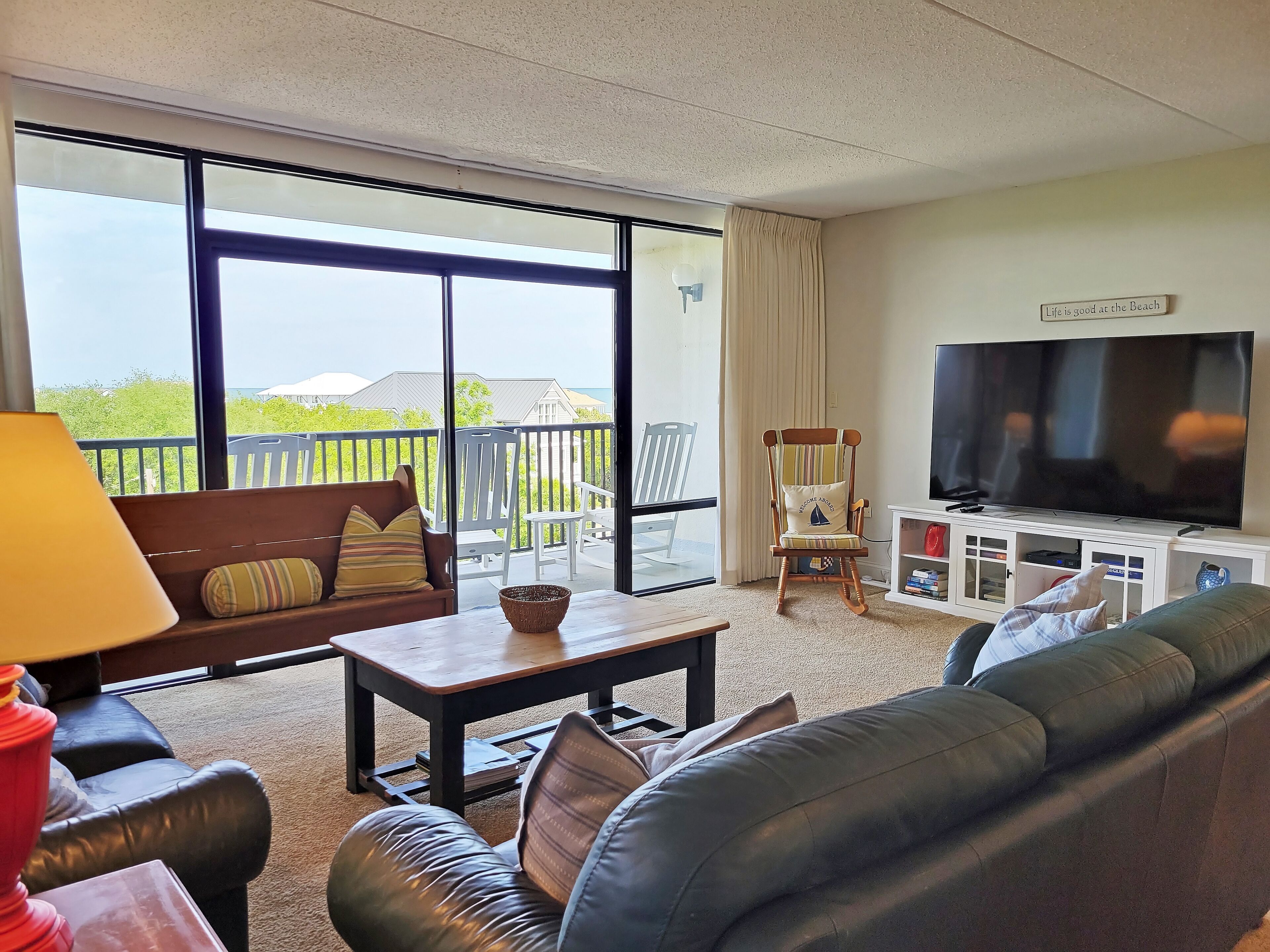 Second row condo, 5th floor, beach access across road, balcony, pool, grill area