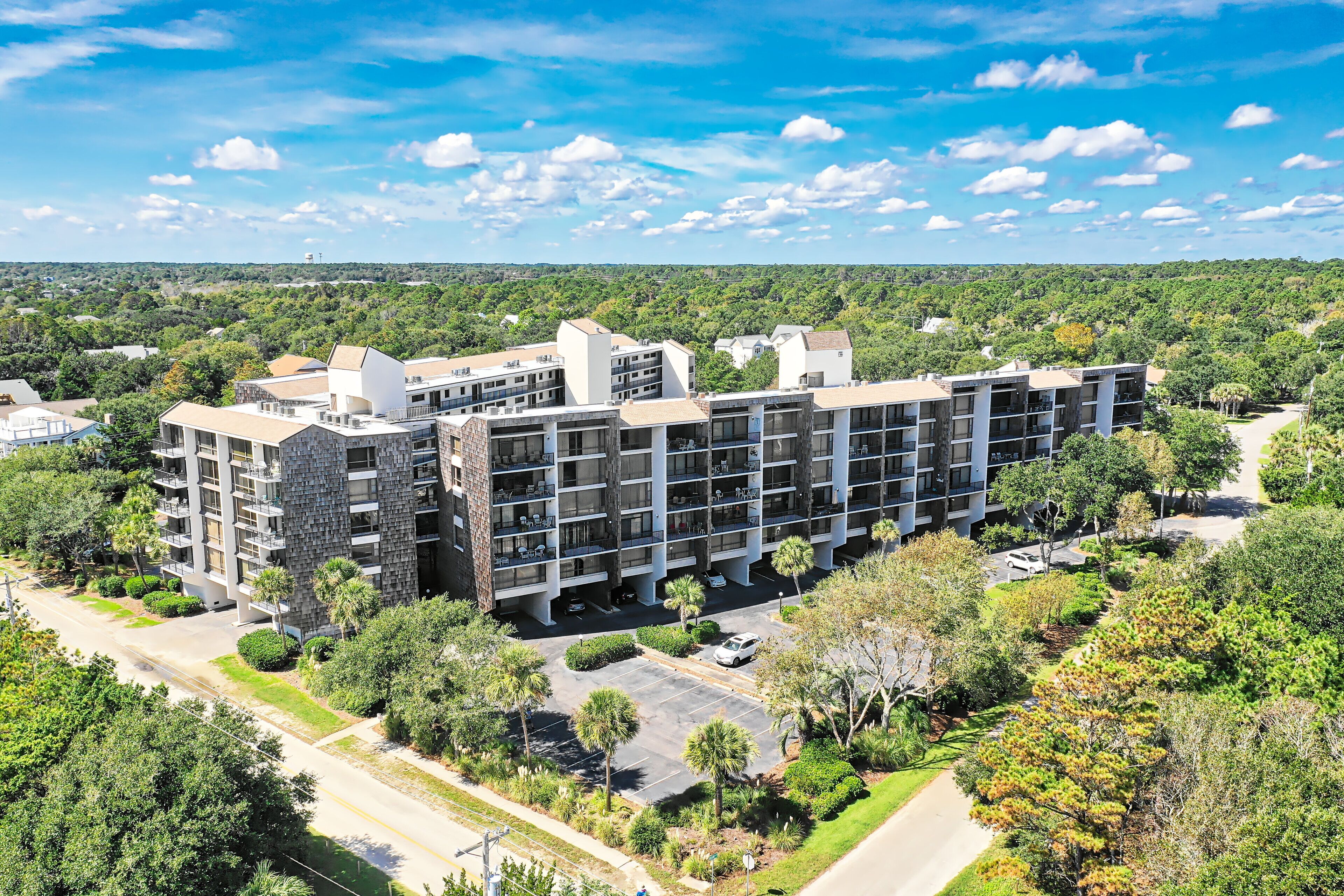 Second row condo, 5th floor, beach access across road, balcony, pool, grill area