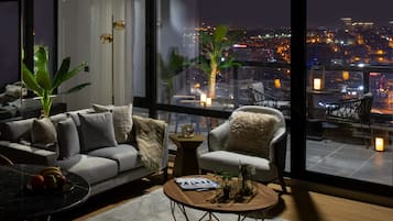 Leilighet – executive | Oppholdsområde | En 109-centimeters LCD-TV med kabel-kanaler samt TV