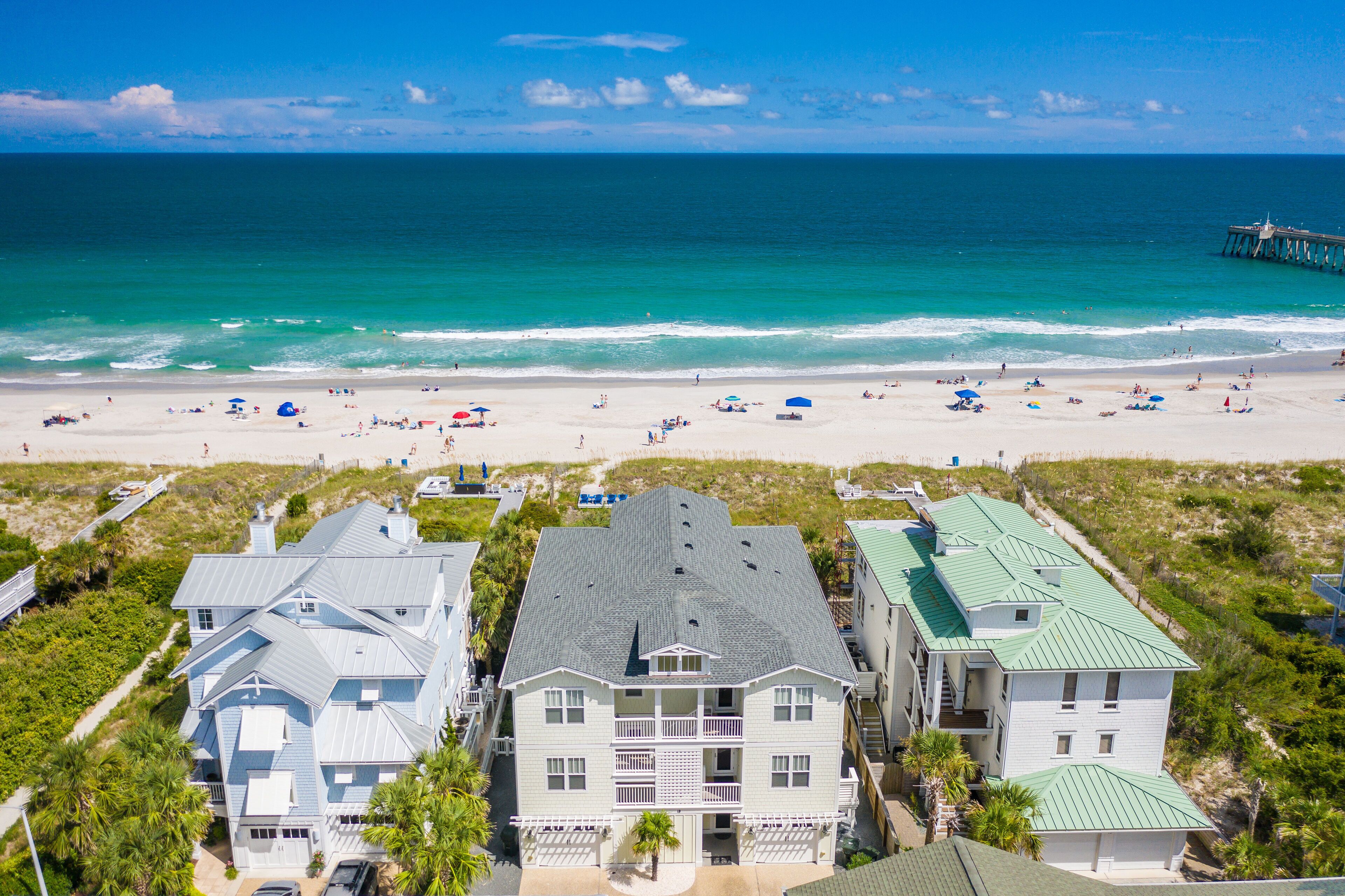 Immaculate 4 bedroom/3 bathroom oceanfront Wrightsville property with private be