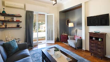 Design Apartment | Living area | Flat-screen TV