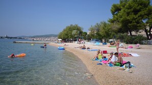 A beach with clear water, people sunbathing, and boats. - A3 - Best Location in Center With the sea View (Vodice)
