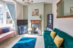 Rumah | Area keluarga | Televisi layar datar 32-inci dengan saluran TV digital dan TV