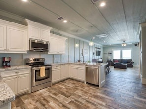 Fridge, microwave, oven, stovetop - Salty Suites, beachfront, opt golf cart (Bolivar Peninsula)