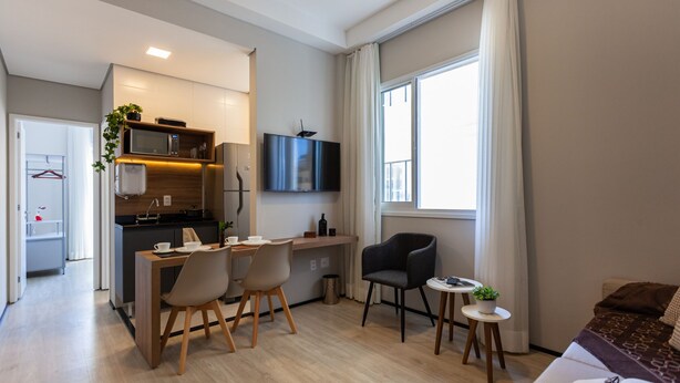 Suite estudio superior | Área de sala de estar