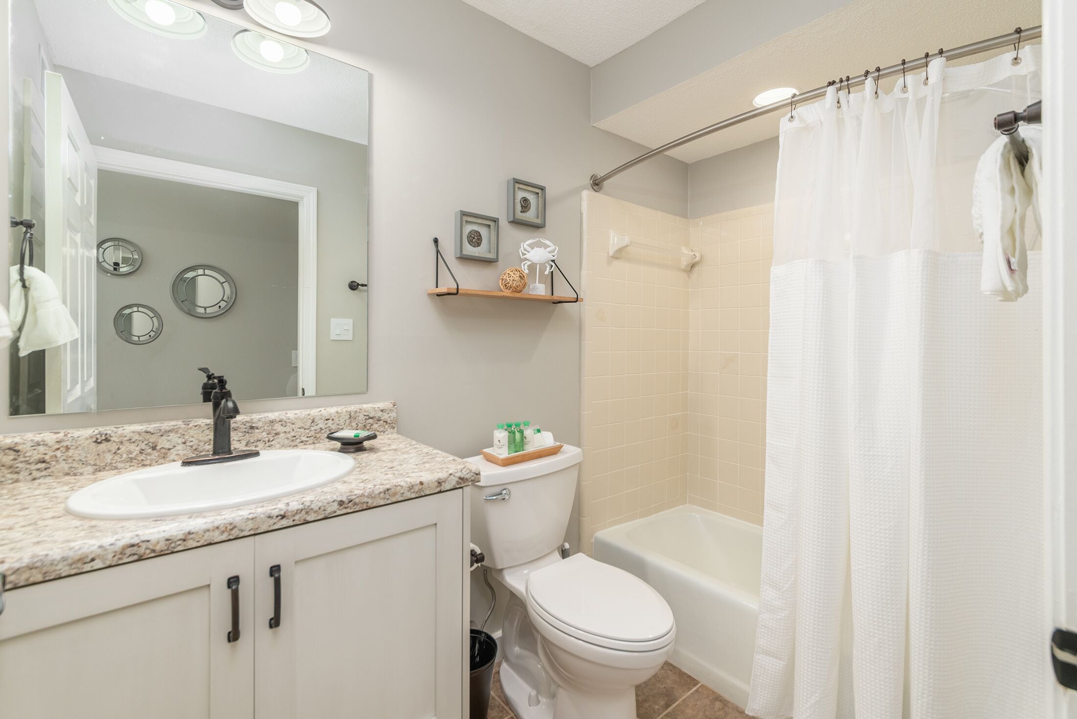 Combined shower/tub, hair dryer, towels, toilet paper
