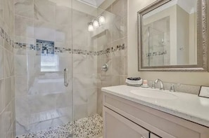 Bathtub, hair dryer, towels, soap