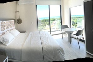 Penthouse panorámico, vista al océano | Vista desde la habitación