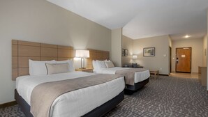 A hotel room with two beds, a small desk, a chair, and a door. - Best Western Plus Rumford Falls (Rumford)
