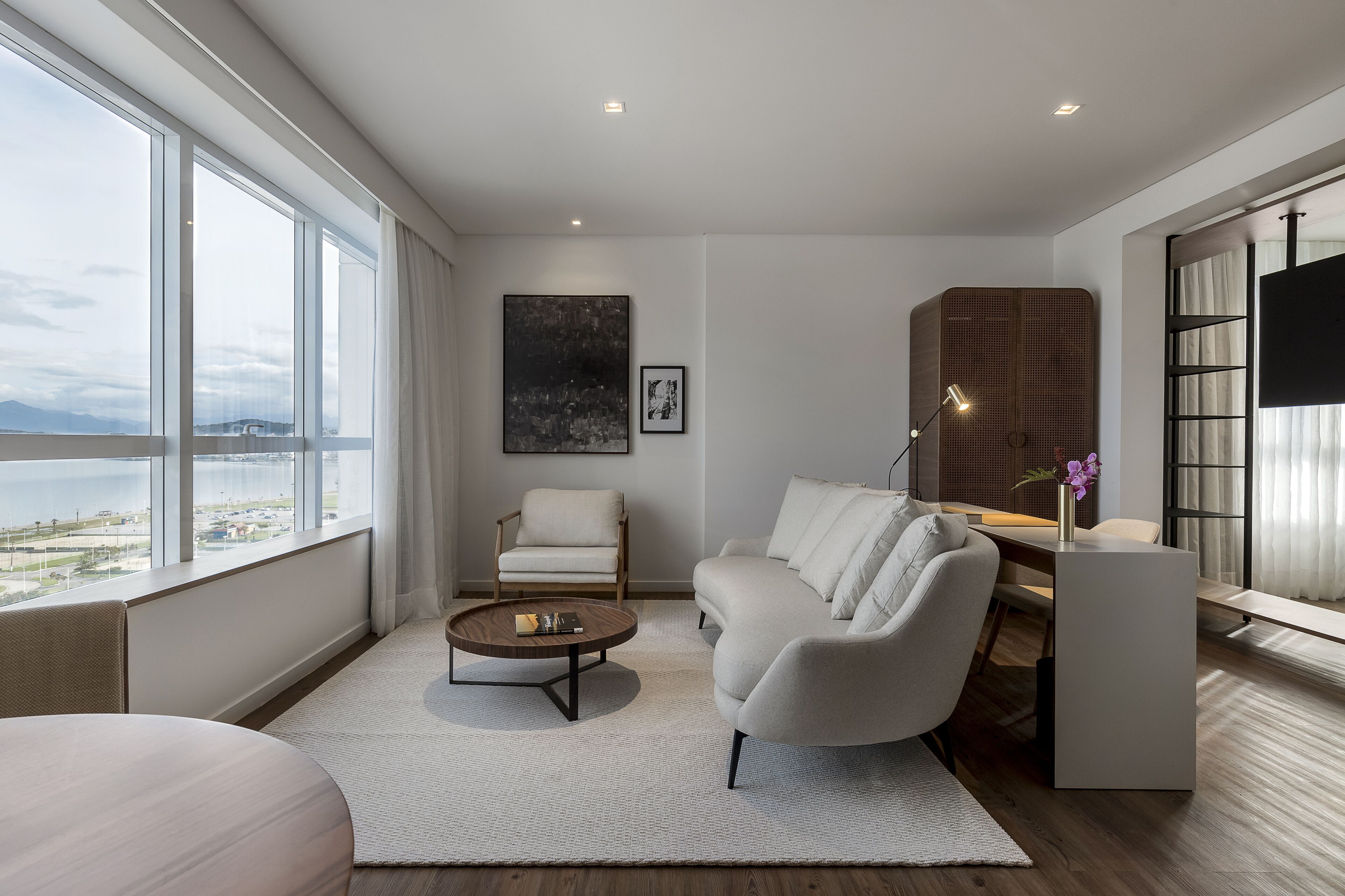 presidential suite, 1 king bed, sea view | living area | 50-inch smart tv with cable channels, tv