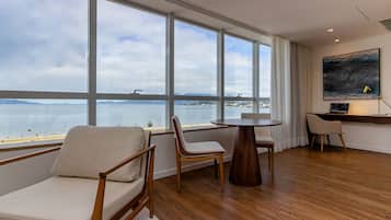 Deluxe Suite, 1 King Bed, Sea View | 1 bedroom, premium bedding, pillow-top beds, minibar
