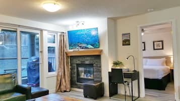 1 bedroom, desk, iron/ironing board, travel crib