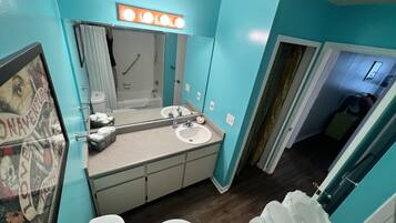 Combined shower/tub, hair dryer, towels, soap