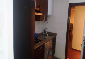 Fridge, stovetop, cookware/dishes/utensils
