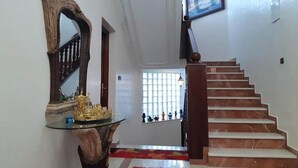 A staircase with a marble finish leading to a landing. - Large Beachfront Villa in Sonaba Agadir 5164 (Agadir)
