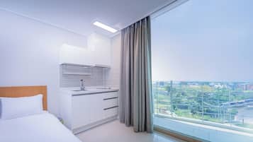 Habitación Deluxe con 2 camas individuales, no fumadores | Cocina privada | Frigorífico y utensilios de cocina