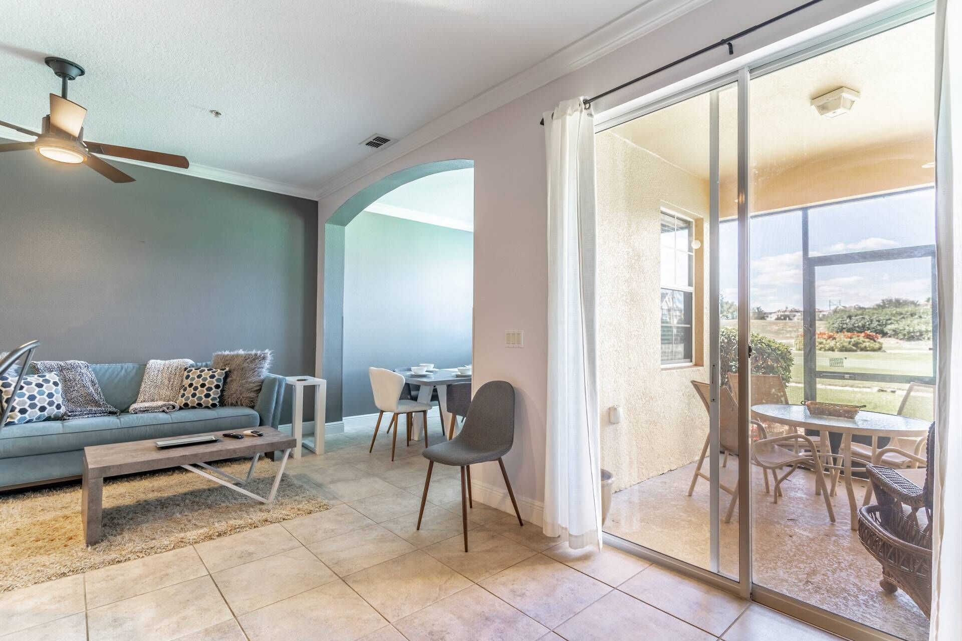 All Downstairs Areas Are Convenient to the Screened In Private Patio