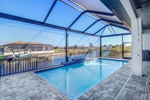 A heated pool, pool loungers