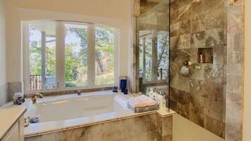 Bathtub, hair dryer, towels, soap