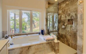 Bathtub, hair dryer, towels, soap