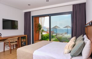 Habitación Deluxe doble, patio | Sábanas de algodón egipcio, ropa de cama de alta calidad, minibar