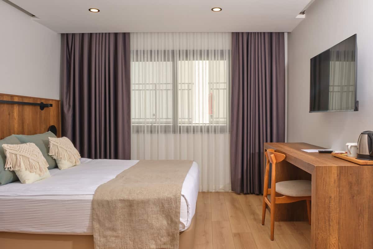 Habitación doble estándar | Sábanas de algodón egipcio, ropa de cama de alta calidad y minibar
