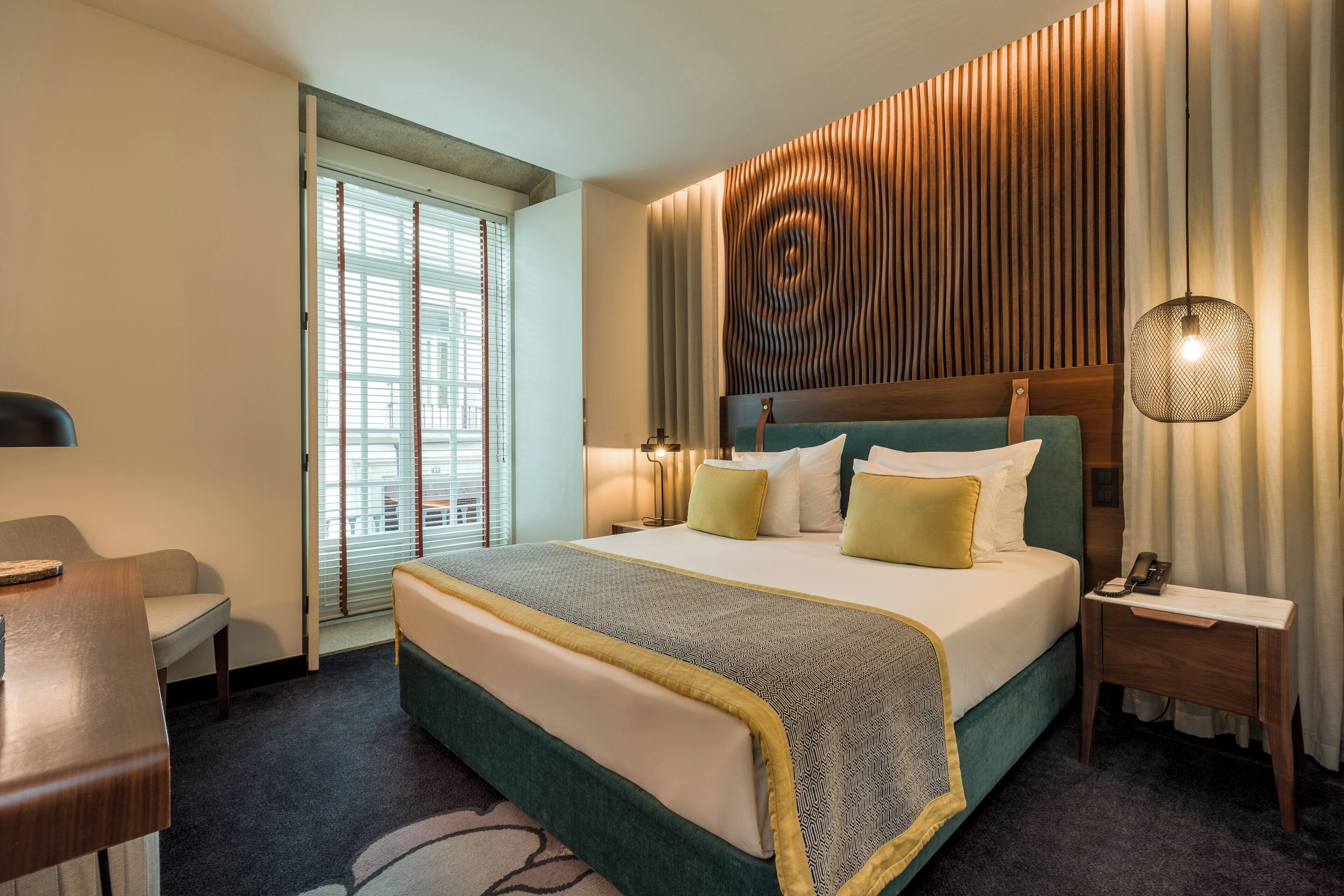 Deluxe Double Room, City View | Minibar, in-room safe, desk, soundproofing