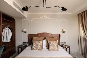 Classic Double or Twin Room | Minibar, in-room safe, desk, laptop workspace