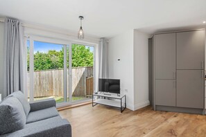 Căn hộ dành cho gia đình | Khu phòng khách | TV màn hình phẳng 