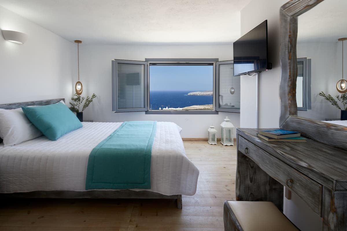 family suite, 2 bedrooms, hot tub, sea view | 1 bedroom, minibar, individually decorated, individually furnished