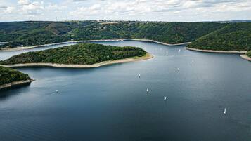 An aerial view of a coastal area with multiple islands and a large body of water.
