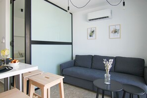 Luxe studio | Woonruimte | Televisie