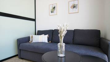 Luxury Studio | Living area | TV