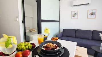 Luxury Studio | Living area | TV