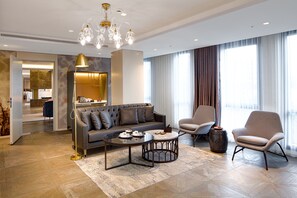 Presidential Suite | Aire de séjour | Téléviseur à écran plat de 42 po avec télévision par satellite