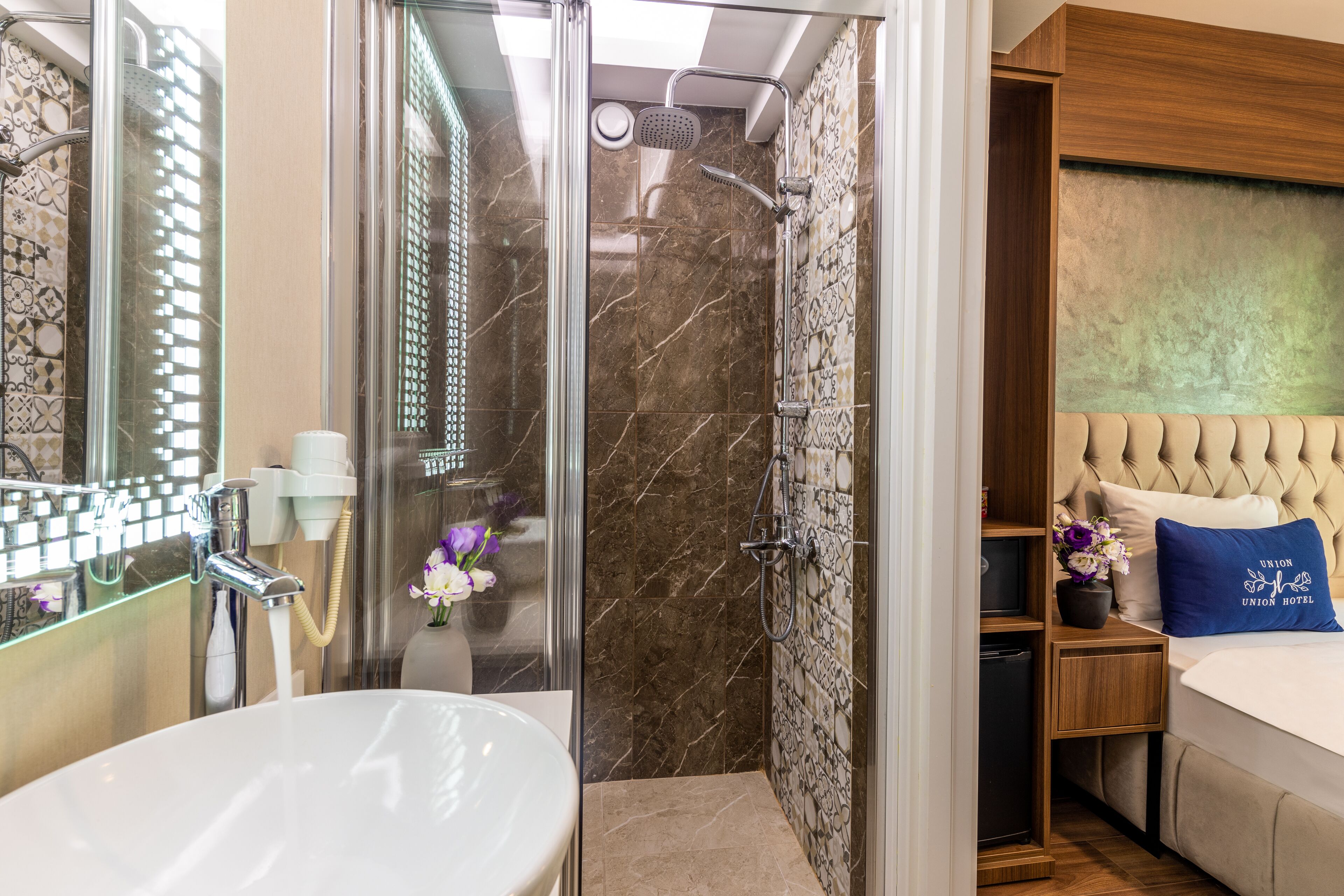 hair dryer, slippers, towels, soap