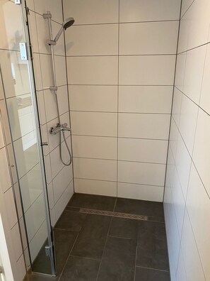Shower, hair dryer, soap, shampoo