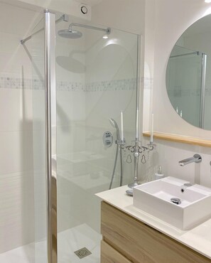 Shower, hair dryer, soap, shampoo