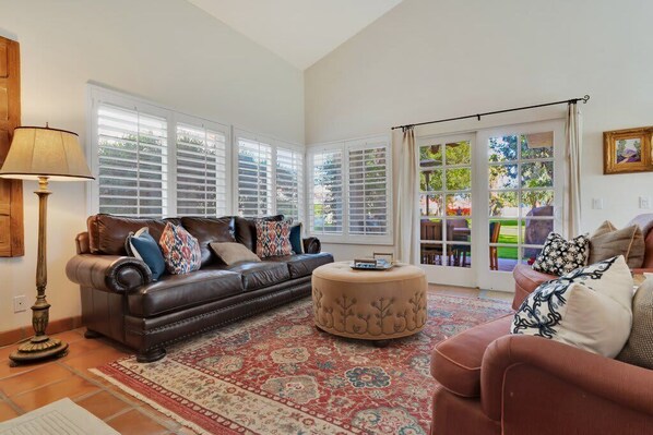 TV, fireplace, books, offices