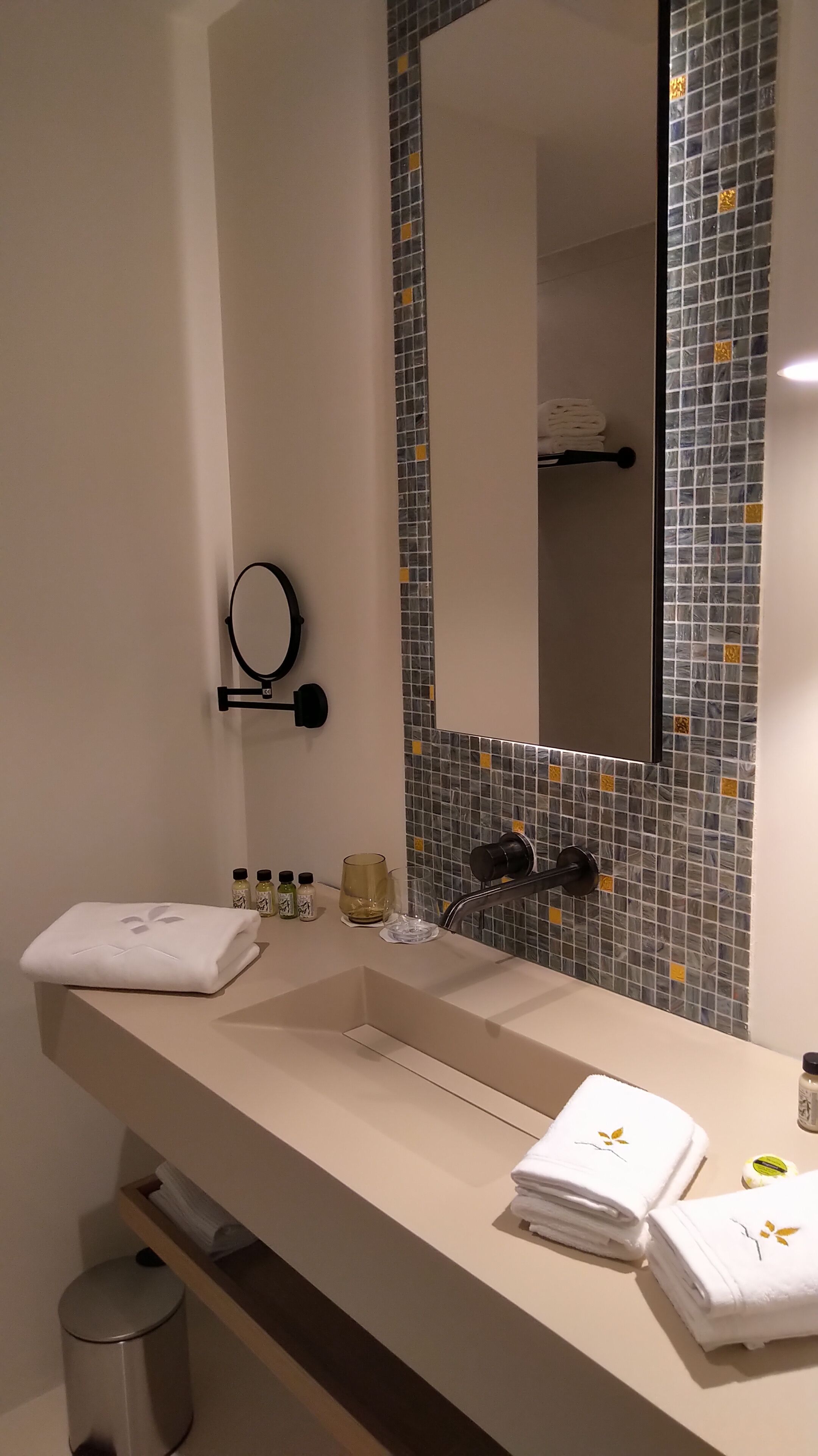 designer toiletries, hair dryer, bathrobes, slippers