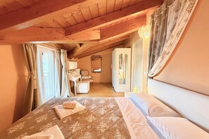 Family Apartment, Multiple Bedrooms, Mountainside (Mastena Elegante) | 2 bedrooms, iron/ironing board, free WiFi, bed sheets