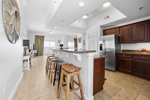 Fridge, microwave, oven, stovetop - Gulf Front Condo | Outdoor & Indoor Pools! (Gulf Shores)