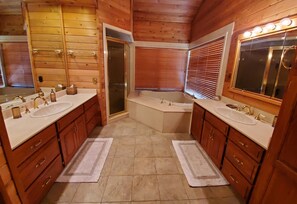 Combined shower/tub, hair dryer, towels, toilet paper