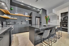 Fridge, microwave, oven, stovetop - Architectural Digest Condo in Old Town Scottsdale Entertainment District (Scottsdale)